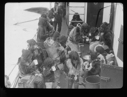 Image of Coffee on deck for many Inuit. 1 crewman